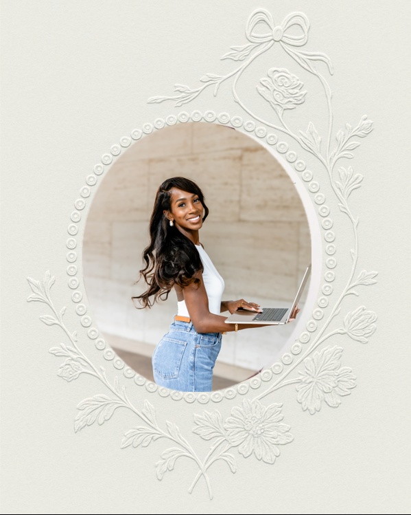 Courtney Washington holding her laptop, surrounded by an embossed floral and bow frame